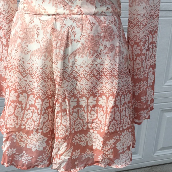 Silky ornate fully lined romper with side pockets. - Picture 2 of 5